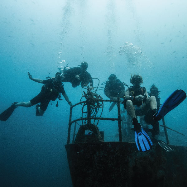 photo of divers in the water in Thailand