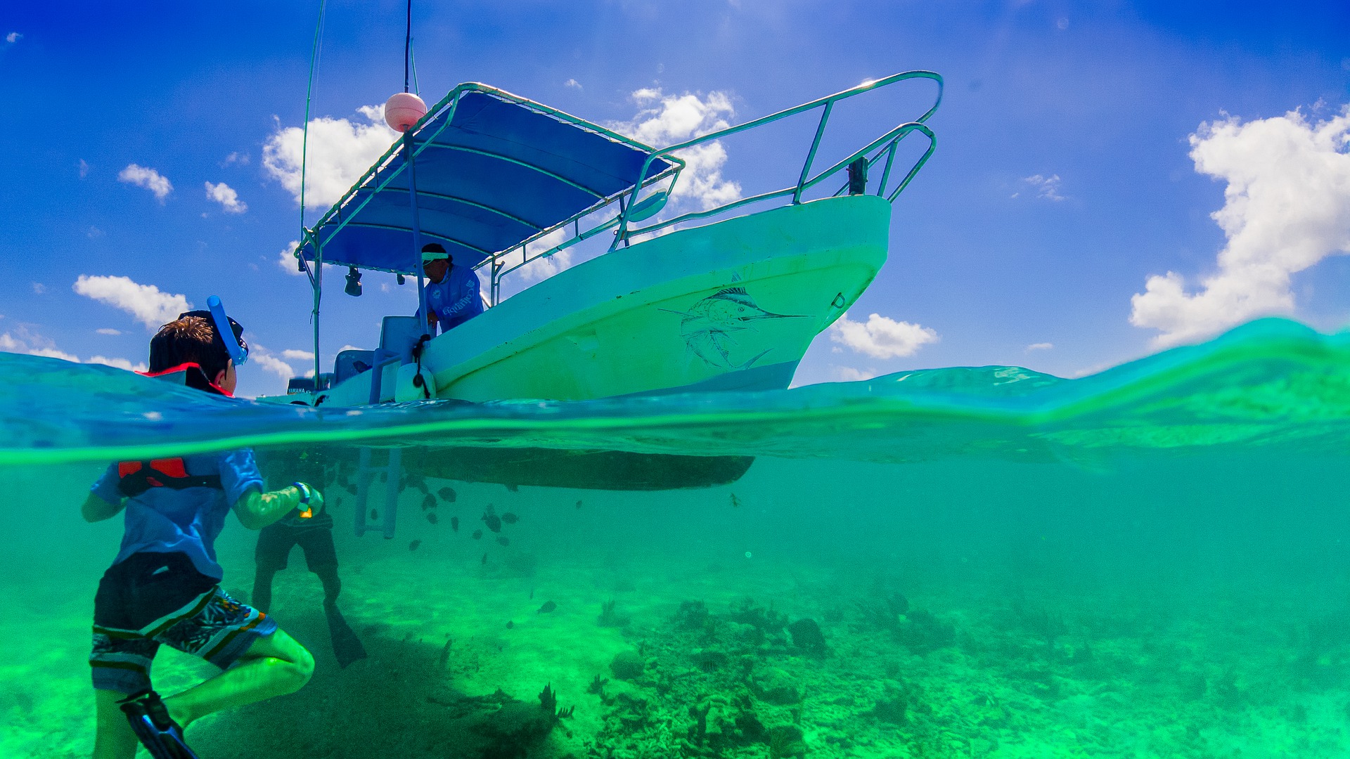 A boat and scuba diver on holiday in Mexico