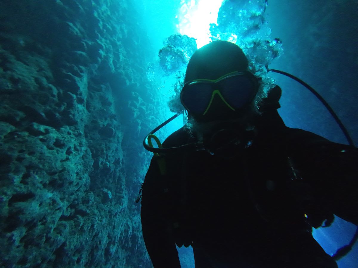 Diver inside tunnel at Inland Sea, Gozo